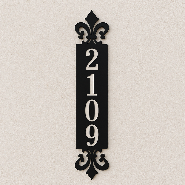 Decorative black house number sign with '2109' on a beige background