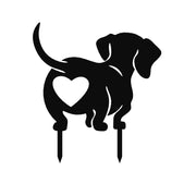 Black steel dachshund garden décor with heart cut-out – playful dog silhouette yard stake, durable weatherproof metal pet lover decoration by Art on Steel, South Africa.